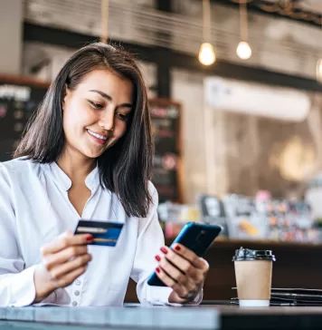 pay-goods-by-credit-card-through-smartphone-coffee-shop-356x364